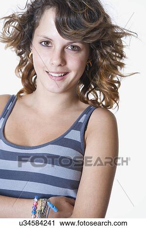 Studio portrait of smiling Teenage girl (14-15) View Large Photo Image Stock Image - Studio portrait of smiling Teenage girl (14-15). Fotosearch