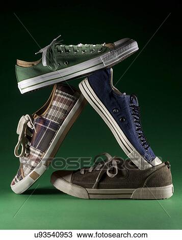 Studio shot of assorted trainers View Large Photo Image Stock Image - Studio shot of assorted trainers. Fotosearch