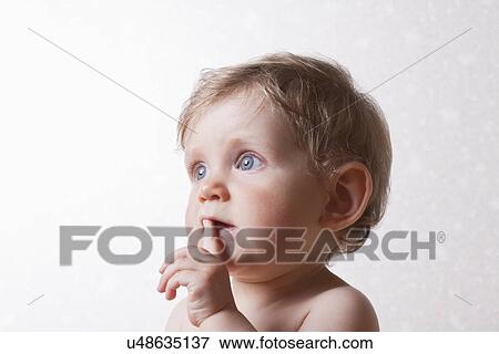 Studio shot of baby girl (12-17 months) View Large Photo Image Stock Photo - Studio shot of baby girl (12-17 months). Fotosearch