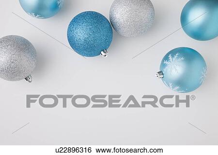 Studio shot of blue and white Christmas ornaments View Large Photo Image Stock Photograph - Studio shot of blue and white Christmas ornaments. Fotosearch