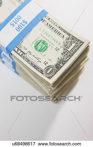 Stock Photo - Studio shot of bunch of one dollar banknotes. Fotosearch