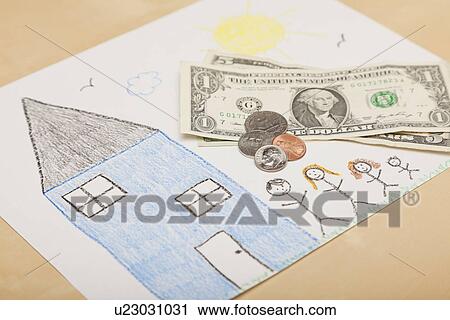 Stock Image - Studio shot of child's drawing of house and family and American currency. Fotosearch