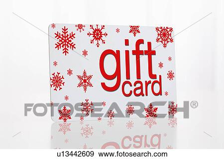 Stock Photo - Studio shot of Christmas gift card. Fotosearch