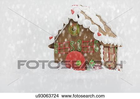 Studio shot of Gingerbread House with snowing effect View Large Photo Image Picture - Studio shot of Gingerbread House with snowing effect. Fotosearch