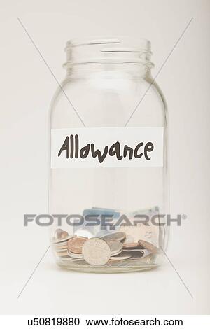 Studio shot of glass jar with coins and banknotes View Large Photo Image Stock Image - Studio shot of glass jar with coins and banknotes. Fotosearch