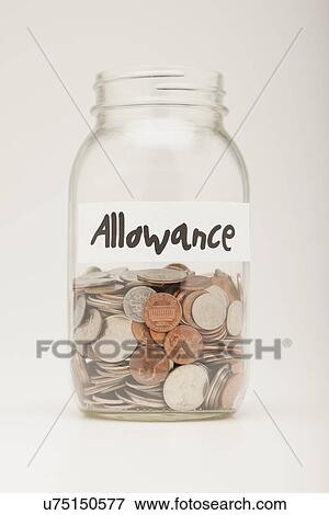 Studio shot of glass jar with coins View Large Photo Image Stock Photo - Studio shot of glass jar with coins. Fotosearch