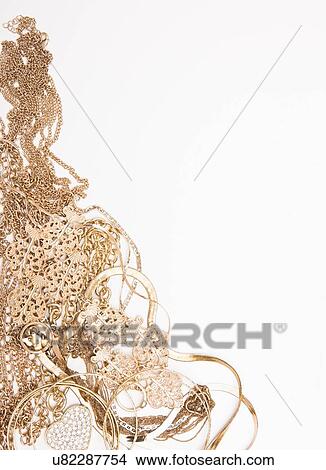 Studio shot of gold jewelry View Large Photo Image Picture - Studio shot of gold jewelry. Fotosearch