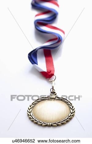 Stock Image - Studio shot of gold medal. Fotosearch