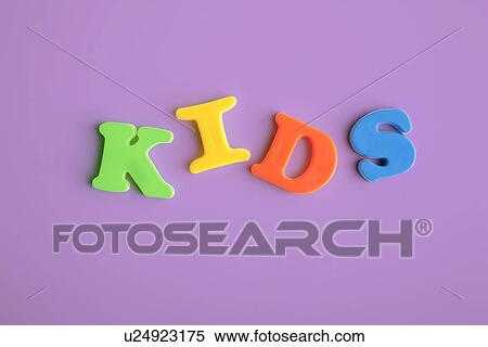Stock Photography - Studio shot of letter magnets forming word kids. Fotosearch