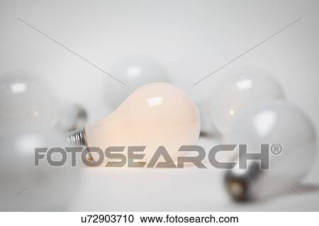 Stock Image - Studio shot of light bulbs. Fotosearch