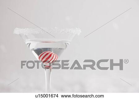 Picture - Studio shot of martini glass with candy inside. Fotosearch