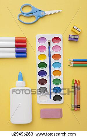 Stock Image - Studio shot of multicolored crayons and paints. Fotosearch