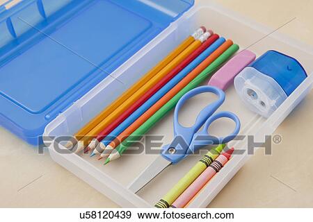 Studio shot of multicolored crayons and scissors in pencil case View Large Photo Image Stock Photo - Studio shot of multicolored crayons and scissors in pencil case. Fotosearch