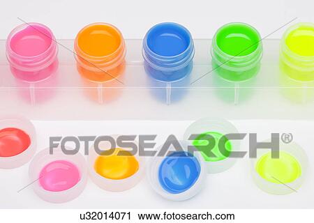 Stock Image - Studio shot of multicolored paints. Fotosearch