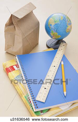 Studio shot of notebook, lunch bag and globe View Large Photo Image Stock Photograph - Studio shot of notebook, lunch bag and globe. Fotosearch