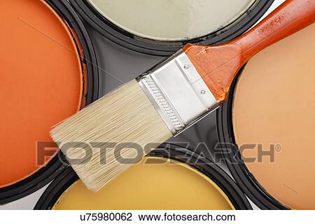 Studio shot of paint brush on paint cans View Large Photo Image Stock Image - Studio shot of paint brush on paint cans. Fotosearch