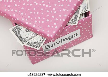 Studio shot of pink box with banknotes View Large Photo Image Stock Photo - Studio shot of pink box with banknotes. Fotosearch