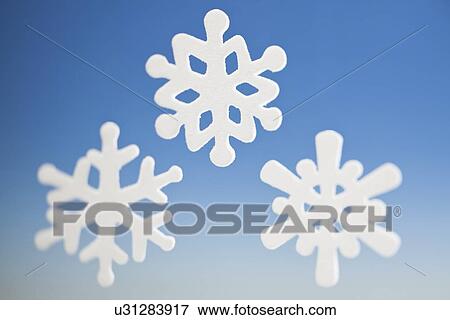Studio shot of snowflakes View Large Photo Image Stock Photo - Studio shot of snowflakes. Fotosearch