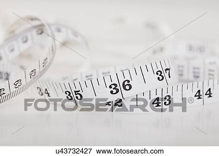 Stock Photo - Tape measure. Fotosearch