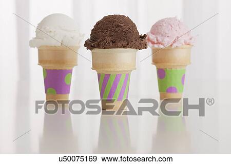 Stock Photo - Three flavored ice creams. Fotosearch