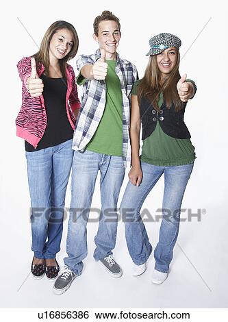 Three teenage friends gesturing thumbs up, portrait View Large Photo Image Stock Photograph - Three teenage friends gesturing thumbs up, portrait. Fotosearch