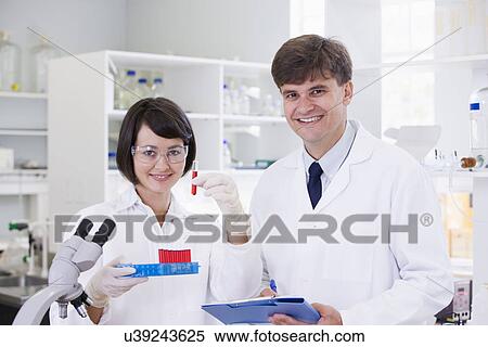 Two scientist in laboratory, portrait View Large Photo Image Stock Photography - Two scientist in laboratory, portrait. Fotosearch