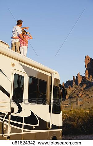 USA, Arizona, father and daughter (10-11) standing on roof of motor home View Large Photo Image Stock Image - USA, Arizona, father and daughter (10-11) standing on roof of motor home. Fotosearch