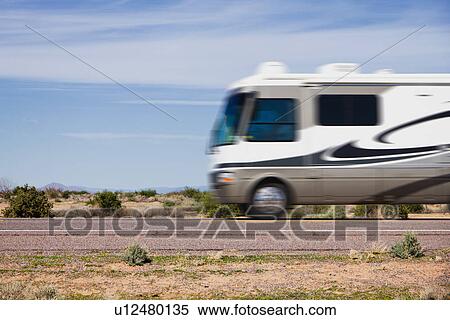 Stock Photography - USA, Arizona, Motor home on road. Fotosearch