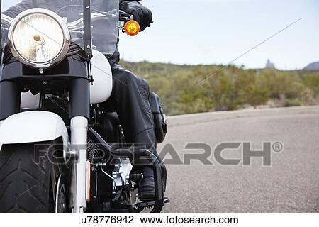 USA, Arizona, Phoenix, Biker on motorcycle in desert area View Large Photo Image Stock Image - USA, Arizona, Phoenix, Biker on motorcycle in desert area. Fotosearch