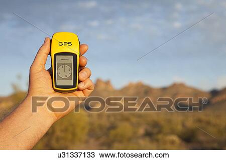 Stock Image - USA, Arizona, Phoenix, GPS equipment in rocky area. Fotosearch