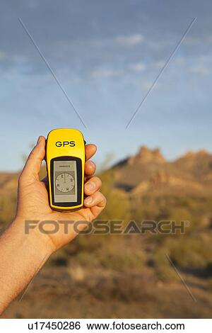 Stock Photograph - USA, Arizona, Phoenix, GPS equipment in rocky area. Fotosearch
