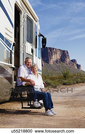 USA, Arizona, senior couple sitting in front of mobile home View Large Photo Image Stock Image - USA, Arizona, senior couple sitting in front of mobile home. Fotosearch