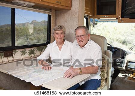 USA, Arizona, Senior couple sitting in motor home View Large Photo Image Stock Photo - USA, Arizona, Senior couple sitting in motor home. Fotosearch