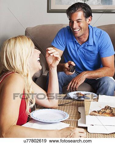 USA, California, Fairfax, Happy couple having pizza View Large Photo Image Stock Photo - USA, California, Fairfax, Happy couple having pizza. Fotosearch
