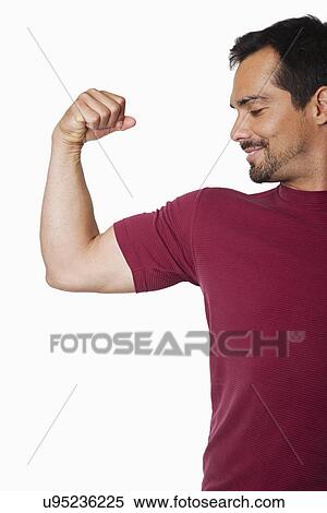 USA, California, Fairfax, Man flexing muscles View Large Photo Image Stock Photography - USA, California, Fairfax, Man flexing muscles. Fotosearch