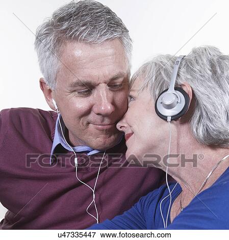USA, California, Fairfax, Mature couple listening music together View Large Photo Image Stock Photo - USA, California, Fairfax, Mature couple listening music together. Fotosearch