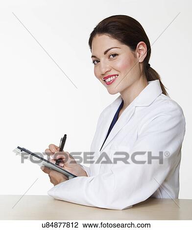 Stock Image - USA, California, Fairfax, Portrait of female doctor. Fotosearch