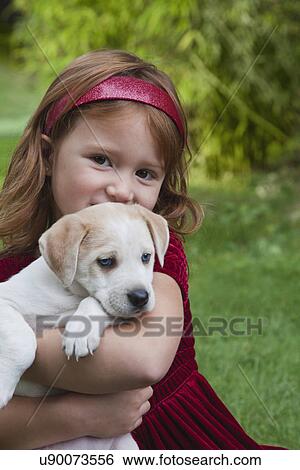 USA, California, Fairfax, portrait of girl (4-5) holding Beagle puppy, outdoors View Large Photo Image Stock Photograph - USA, California, Fairfax, portrait of girl (4-5) holding Beagle puppy, outdoors. Fotosearch
