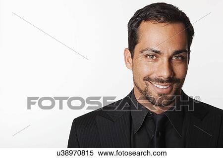Stock Photography - USA, California, Fairfax, Studio portrait of man dressed in black. Fotosearch