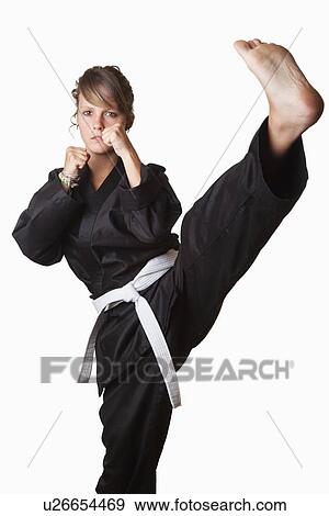 Stock Photo - USA, California, Fairfax, Teen girl (14-15) wearing gi. Fotosearch