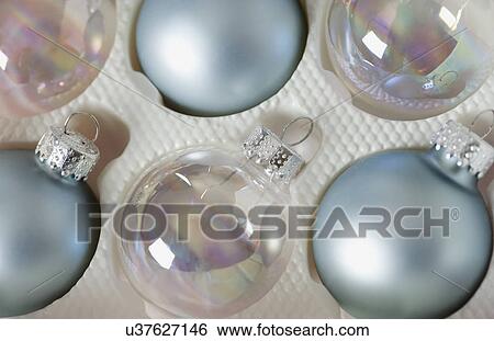 Stock Photograph - USA, California, La Quinta, Christmas decorations in box. Fotosearch