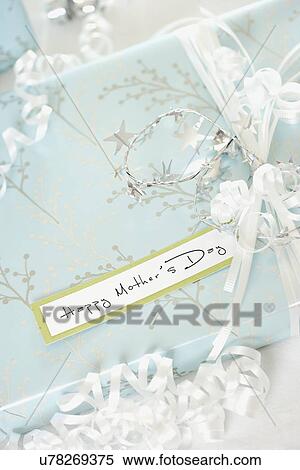 Stock Photography - USA, California, La Quinta, Mother's Day gift with greeting card. Fotosearch