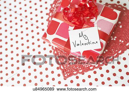 USA, California, La Quinta, Valentine's Day gift with greeting card View Large Photo Image Stock Photo - USA, California, La Quinta, Valentine's Day gift with greeting card. Fotosearch