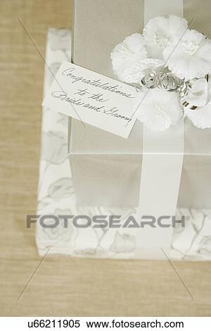 Stock Photography - USA, California, La Quinta, Wedding gifts with greeting card. Fotosearch