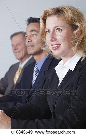 USA California, Larkspur, Businesspeople at meeting View Large Photo Image Stock Photo - USA California, Larkspur, Businesspeople at meeting. Fotosearch
