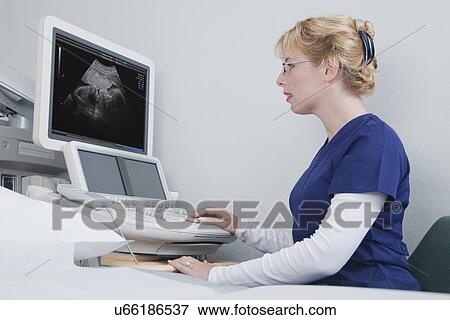 USA California, Larkspur, Woman at ultrasound monitoring system View Large Photo Image Stock Photo - USA California, Larkspur, Woman at ultrasound monitoring system. Fotosearch