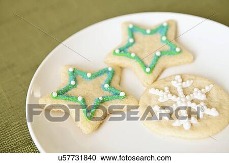 Stock Image - USA, California, Lawndale, Christmas cookies on plate. Fotosearch