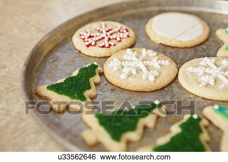Stock Photograph - USA, California, Lawndale, Christmas cookies on tray. Fotosearch