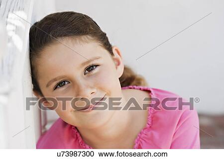 USA, California, Lawndale, Portrait of girl (8-9) smiling View Large Photo Image Stock Image - USA, California, Lawndale, Portrait of girl (8-9) smiling. Fotosearch