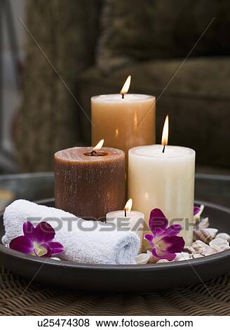 USA, California, Oakland, candles and orchids on table View Large Photo Image Stock Photo - USA, California, Oakland, candles and orchids on table. Fotosearch